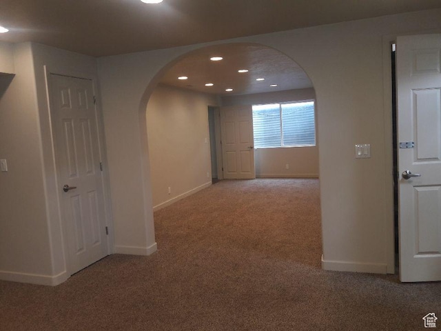 1584 E Petunia Way, Sandy, UT 84092 - corridor featuring arched walkways, carpet, and recessed lighting