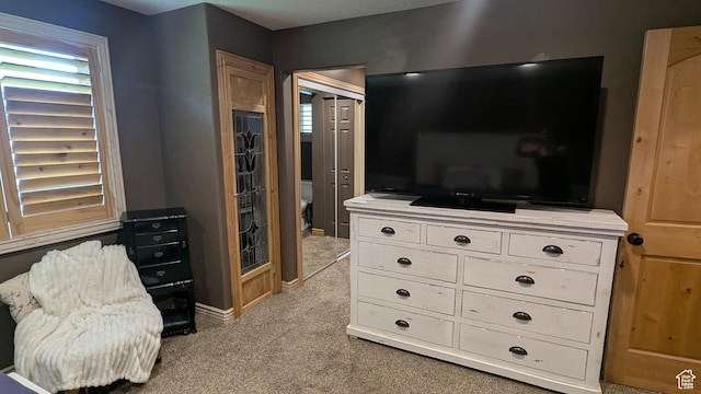 1584 E Petunia Way, Sandy, UT 84092 - bedroom featuring light carpet and baseboards