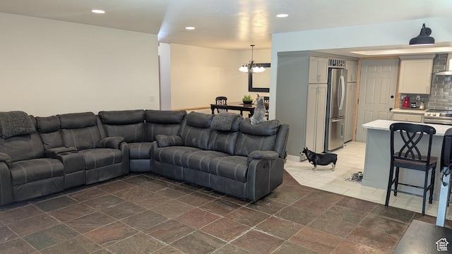 1584 E Petunia Way, Sandy, UT 84092 - living room with a chandelier and recessed lighting