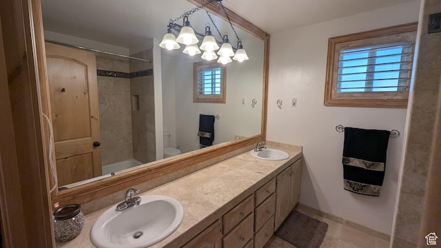 1584 E Petunia Way, Sandy, UT 84092 - full bathroom featuring healthy amount of natural light, double vanity, tub / shower combination, and tile patterned flooring