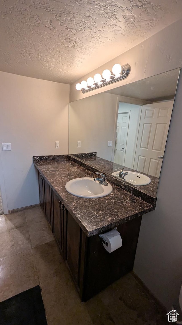1584 E Petunia Way, Sandy, UT 84092 - bathroom with vanity and a textured ceiling