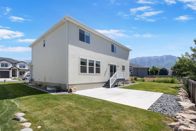 181 W 580 S, Orem, UT 84058 - rear view of property featuring a patio area, a mountain view, and stucco siding