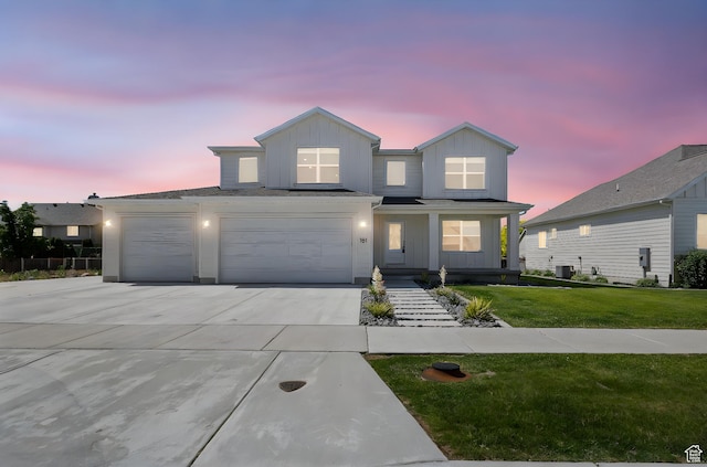 181 W 580 S, Orem, UT 84058 - traditional home with board and batten siding, concrete driveway, and a yard