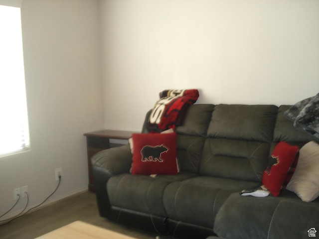 281 E 7th St S Unit 8, Ogden, UT 84404 - living area featuring wood finished floors and baseboards