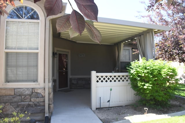 3072 W Leisure Villas Ct, West Jordan, UT 84084 - doorway to property featuring stone siding