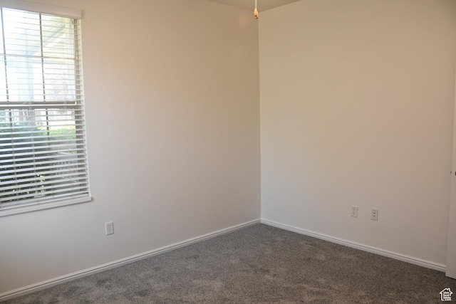 3072 W Leisure Villas Ct, West Jordan, UT 84084 - empty room with healthy amount of natural light and carpet