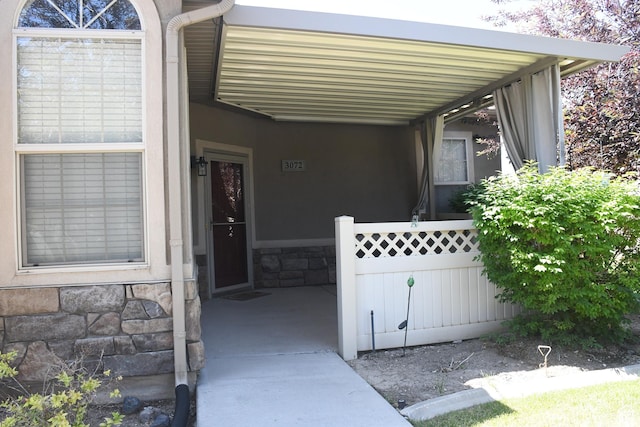 3072 W Leisure Villas Ct, West Jordan, UT 84084 - doorway to property featuring stone siding and stucco siding
