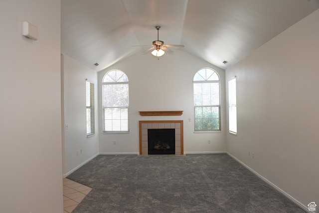 3072 W Leisure Villas Ct, West Jordan, UT 84084 - unfurnished living room with a ceiling fan, a tile fireplace, tile patterned floors, carpet flooring, and lofted ceiling