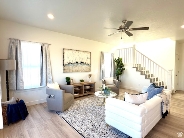 7494 N Silver Ridge Rd Unit 3466, Eagle Mountain, UT 84005 - living area featuring stairway, wood finished floors, ceiling fan, and recessed lighting