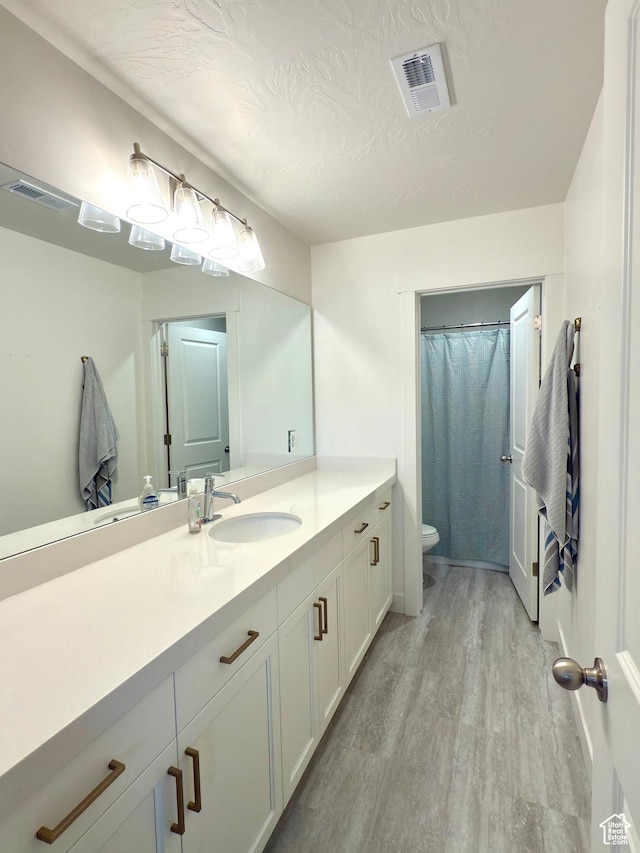 7494 N Silver Ridge Rd Unit 3466, Eagle Mountain, UT 84005 - bathroom with wood finished floors and vanity