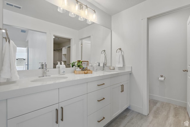 7494 N Silver Ridge Rd Unit 3466, Eagle Mountain, UT 84005 - full bath with double vanity and wood finished floors