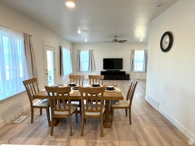 7494 N Silver Ridge Rd Unit 3466, Eagle Mountain, UT 84005 - dining space featuring light wood-type flooring and a ceiling fan