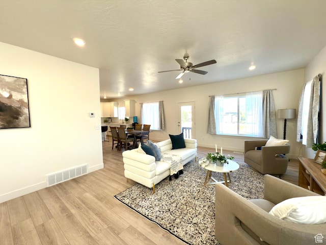 7494 N Silver Ridge Rd Unit 3466, Eagle Mountain, UT 84005 - living room featuring light wood-style floors, recessed lighting, and a ceiling fan