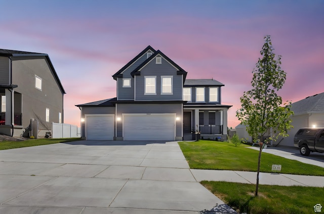 7494 N Silver Ridge Rd Unit 3466, Eagle Mountain, UT 84005 - traditional home with driveway, a garage, and a front yard