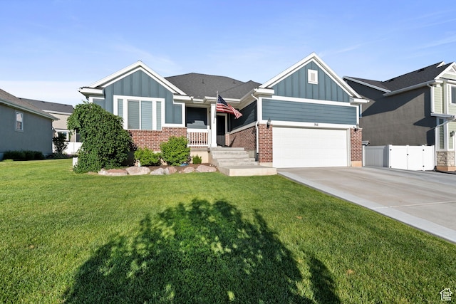 916 Cold Creek Way, Layton, UT 84041 - view of front of home featuring board and batten siding, brick siding, and concrete driveway