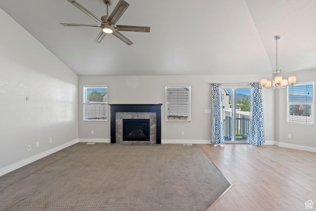 916 Cold Creek Way, Layton, UT 84041 - unfurnished living room with plenty of natural light, a chandelier, ceiling fan, a tile fireplace, and high vaulted ceiling