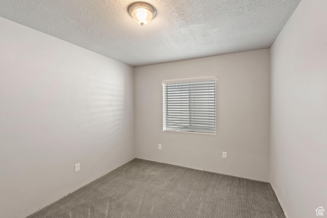 916 Cold Creek Way, Layton, UT 84041 - carpeted spare room featuring a textured ceiling