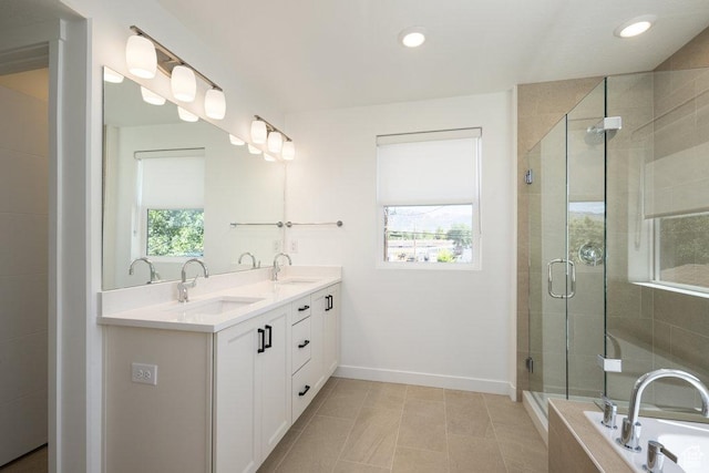 6556 S Jefferson St Unit 15, Murray, UT 84107 - full bathroom with double vanity, a garden tub, a shower stall, recessed lighting, and tile patterned flooring