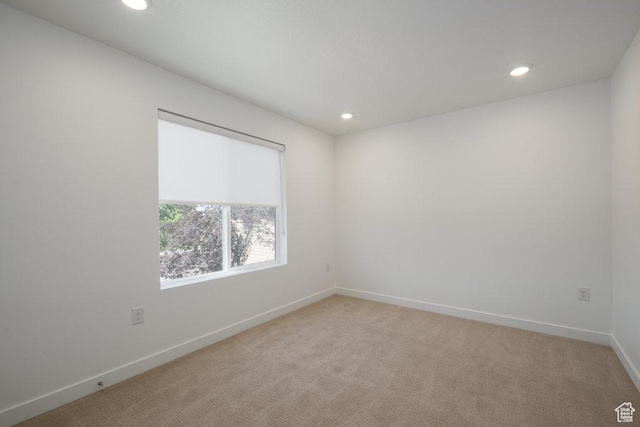 6556 S Jefferson St Unit 15, Murray, UT 84107 - empty room with recessed lighting and light carpet
