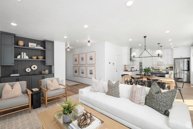 6556 S Jefferson St Unit 15, Murray, UT 84107 - living area with recessed lighting and light wood-type flooring