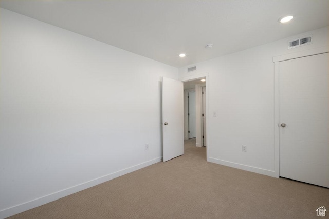 6556 S Jefferson St Unit 15, Murray, UT 84107 - unfurnished bedroom featuring light colored carpet and recessed lighting