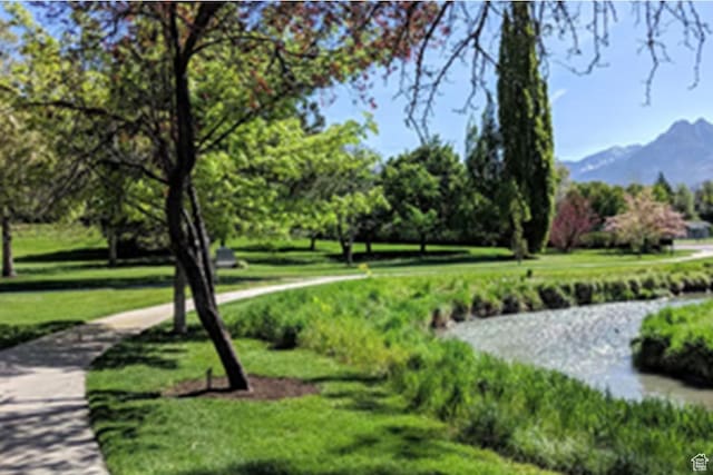 6556 S Jefferson St Unit 15, Murray, UT 84107 - view of property's community with a mountain view and a lawn