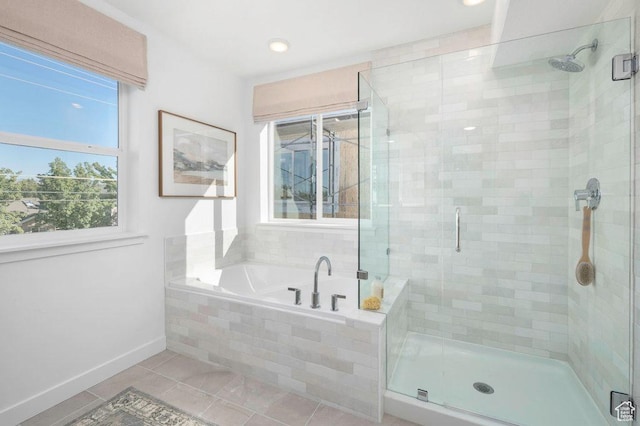 6556 S Jefferson St Unit 15, Murray, UT 84107 - bathroom featuring tile patterned floors, a stall shower, and a garden tub