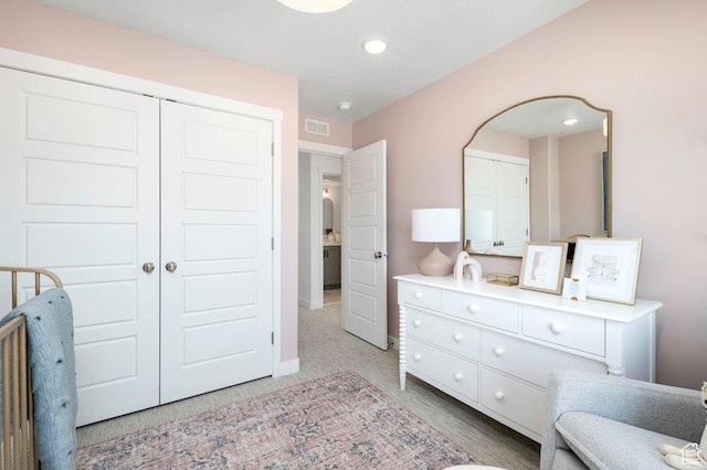 6556 S Jefferson St Unit 15, Murray, UT 84107 - bedroom with light colored carpet, recessed lighting, arched walkways, and a closet