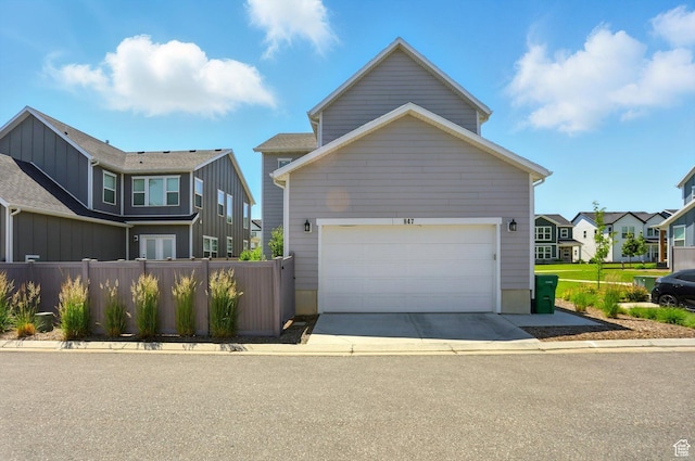 847 N 2125 W, Layton, UT 84041 - view of front of property with concrete driveway, a residential view, and a garage