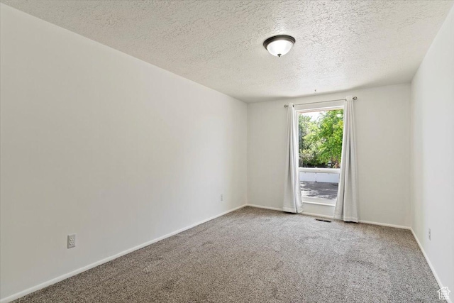 1128 W 4650 S, Riverdale, UT 84405 - carpeted empty room with a textured ceiling and baseboards