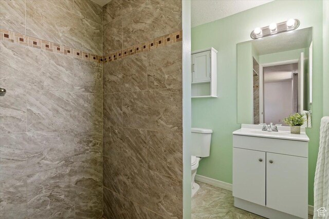 1128 W 4650 S, Riverdale, UT 84405 - full bathroom with vanity, tiled shower, and marble finish floors