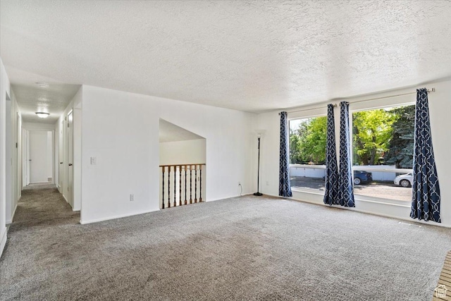 1128 W 4650 S, Riverdale, UT 84405 - empty room featuring carpet flooring and a textured ceiling