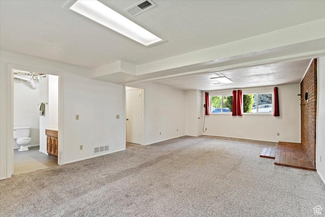 1128 W 4650 S, Riverdale, UT 84405 - below grade area featuring light carpet and baseboards