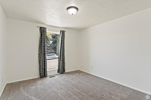 1128 W 4650 S, Riverdale, UT 84405 - carpeted spare room featuring a textured ceiling and baseboards