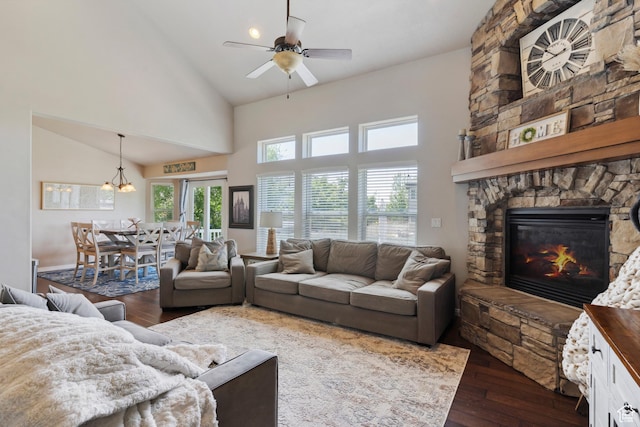 163 Cold Creek Way, Layton, UT 84041 - living area with high vaulted ceiling, wood finished floors, a fireplace, and a ceiling fan
