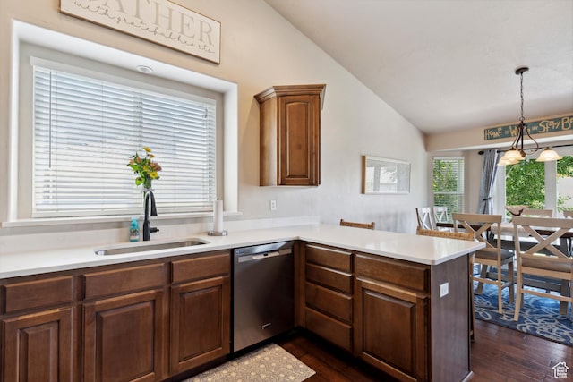 163 Cold Creek Way, Layton, UT 84041 - kitchen featuring stainless steel dishwasher, lofted ceiling, dark wood-type flooring, a peninsula, and light countertops