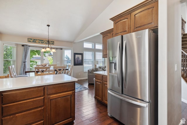 163 Cold Creek Way, Layton, UT 84041 - kitchen featuring stainless steel fridge, lofted ceiling, light countertops, and decorative light fixtures