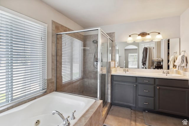 163 Cold Creek Way, Layton, UT 84041 - bathroom with a tub with jets, double vanity, a stall shower, and plenty of natural light