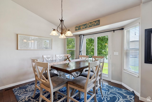 163 Cold Creek Way, Layton, UT 84041 - dining area featuring a chandelier, dark wood-type flooring, and vaulted ceiling