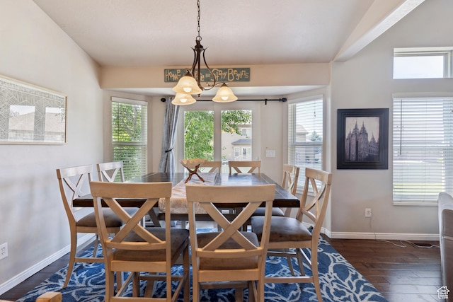 163 Cold Creek Way, Layton, UT 84041 - dining area featuring healthy amount of natural light, a chandelier, and dark wood finished floors