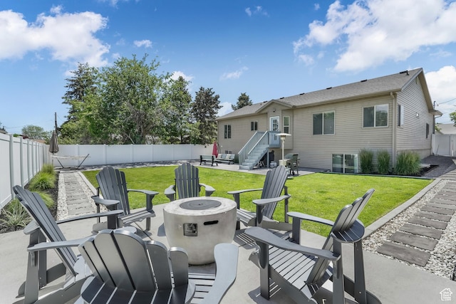 450 N 200 E, Lehi, UT 84043 - fenced backyard featuring a fire pit and a patio