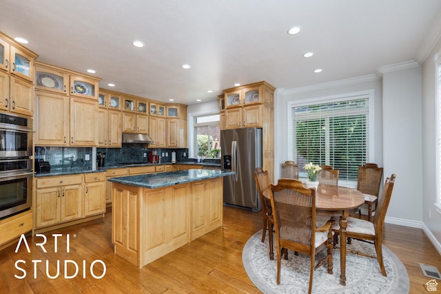 841 E 5875 S, South Ogden, UT 84405 - kitchen with stainless steel appliances, under cabinet range hood, ornamental molding, a kitchen island, and backsplash
