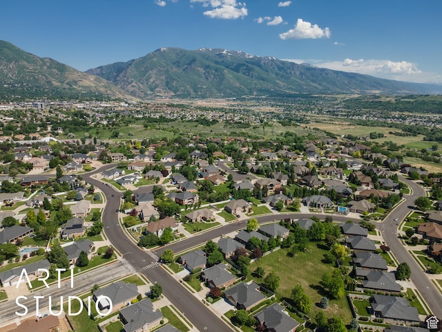 841 E 5875 S, South Ogden, UT 84405 - aerial view of property and surrounding area featuring mountains and nearby suburban area