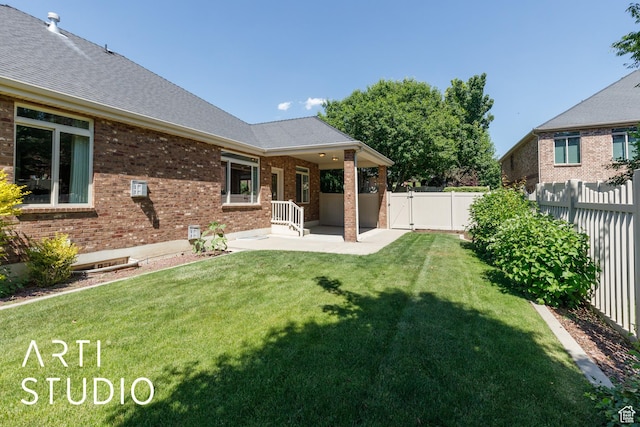 841 E 5875 S, South Ogden, UT 84405 - fenced backyard featuring a patio area and a gate