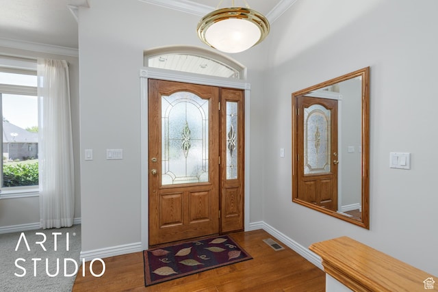 841 E 5875 S, South Ogden, UT 84405 - foyer featuring wood finished floors, healthy amount of natural light, and crown molding