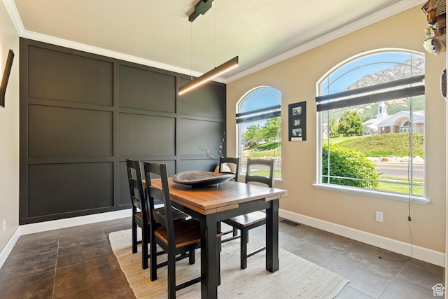 665 E 3550 N, North Ogden, UT 84414 - dining space with ornamental molding and baseboards