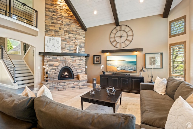 665 E 3550 N, North Ogden, UT 84414 - living room featuring high vaulted ceiling, stairway, beam ceiling, a fireplace, and tile patterned flooring