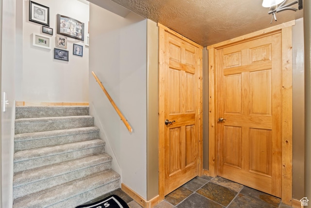 665 E 3550 N, North Ogden, UT 84414 - stairs featuring baseboards and stone finish floors