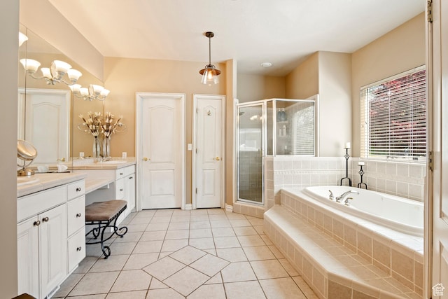 665 E 3550 N, North Ogden, UT 84414 - bathroom featuring vanity, a garden tub, a stall shower, and tile patterned flooring