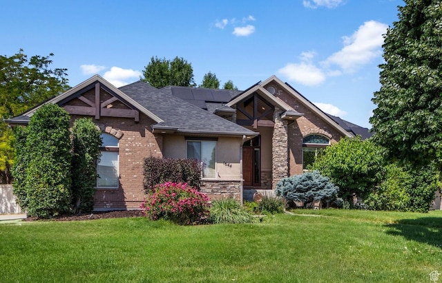 1644 W 1200 N, Farr West, UT 84404 - view of front of property featuring a shingled roof, a front yard, stone siding, and stucco siding